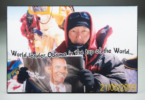 Photograph of a Sherpa on Top of a Mountain