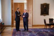 Image courtesy of the Barack Obama Presidential Library, President Barack Obama talks with Germ…
