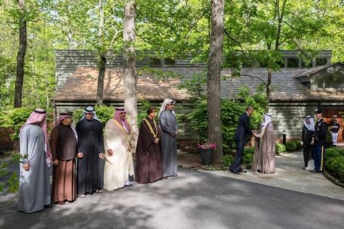 Image courtesy of the Barack Obama Presidential Library, President Barack Obama shakes hands wi…