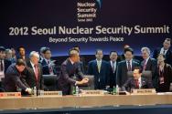 Image courtesy of the Barack Obama Presidential Library, President Barack Obama jokingly covers…