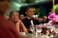 Image courtesy of the Barack Obama Presidential Library, President Barack Obama smiles while wa…