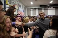 Image courtesy of the Barack Obama Presidential Library, President Barack Obama greets audience…