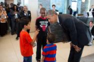 Image courtesy of the Barack Obama Presidential Library, President Barack Obama talks with kids…
