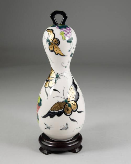 Porcelain Sculpture with Butterfly Decorations