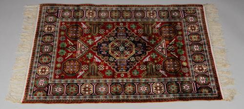 Woven Rug with Geometric Patterns