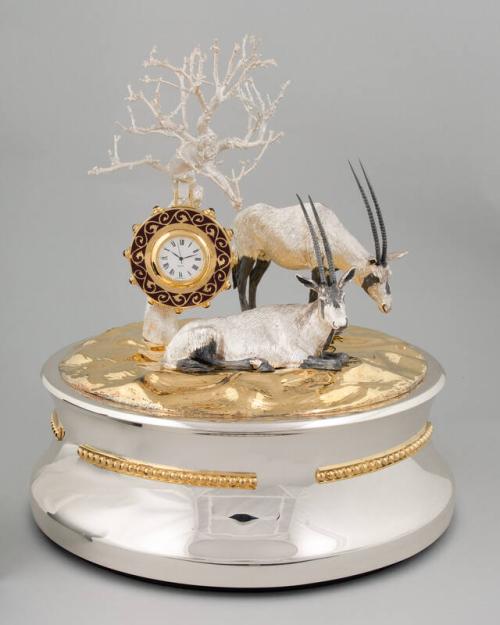 Statue of Two Oryx and a Tree with a Removable Clock