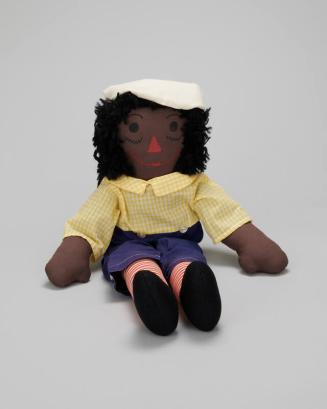 Rag Doll in a Yellow Shirt and Blue Pants