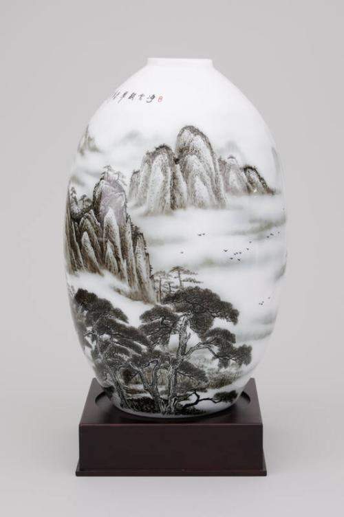 Unglazed Vase with Mountain Design