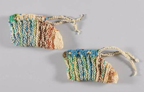 Off-White Knit Slippers with Orange, Brown, and Green Stripes
