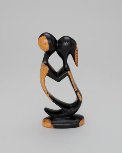 Carved Wood Statue of Two People Embracing