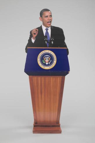 Standee of President Obama Speaking at a Podium