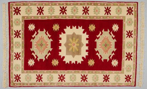 Red, Cream, and Light Green Rug