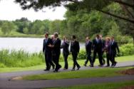 Image courtesy of the Barack Obama Presidential Library, President Barack Obama talks with Germ…