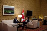 Image courtesy of the Barack Obama Presidential Library, President Barack Obama talks with Cana…