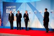 Image courtesy of the Barack Obama Presidential Library, President Barack Obama is greeted by, …