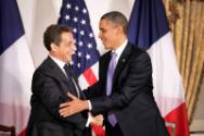 Image courtesy of the Barack Obama Presidential Library, President Barack Obama greets Presiden…
