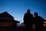 Image courtesy of the Barack Obama Presidential Library, President Barack Obama walks with Caro…