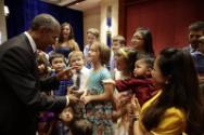 Image courtesy of the Barack Obama Presidential Library, President Barack Obama greets children…