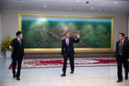 Image courtesy of the Barack Obama Presidential Library, President Barack Obama walks past a pa…